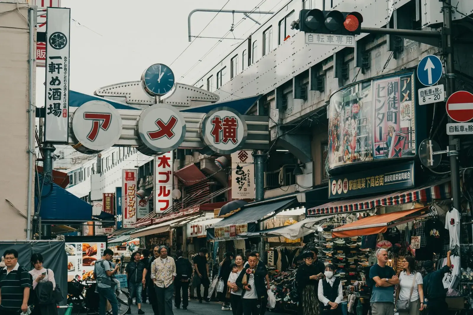 Crowded Ameyoko market street with shops in Ueno, Tokyo