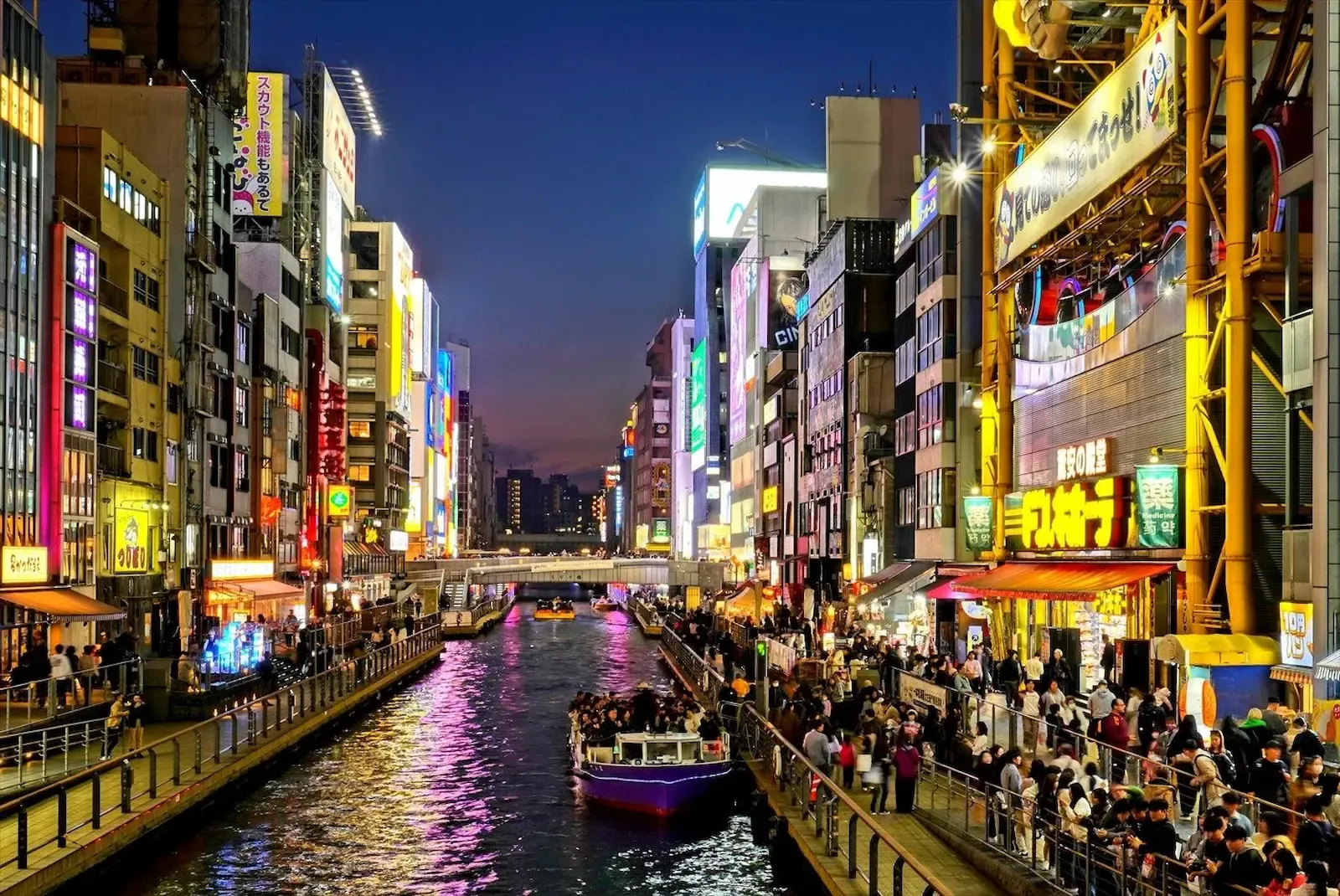 Colorful buildings and signs along Dotonbori Canal in Osaka