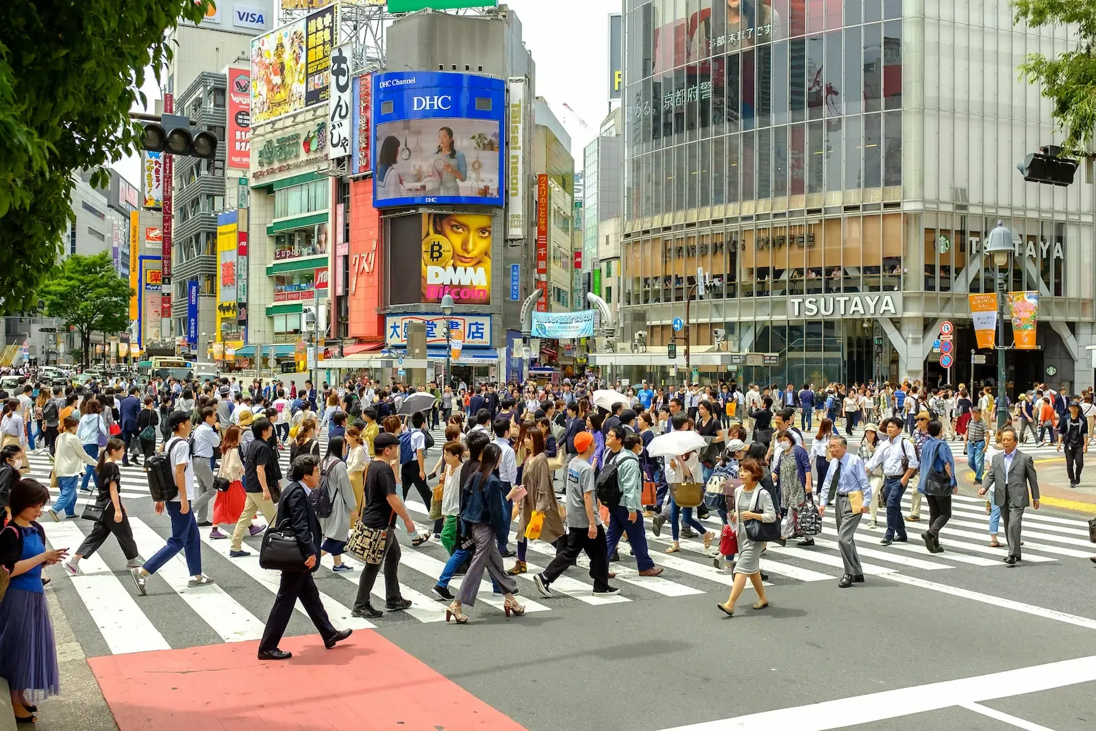 Pedestrians crossing Shibuya Crossing in Tokyo
