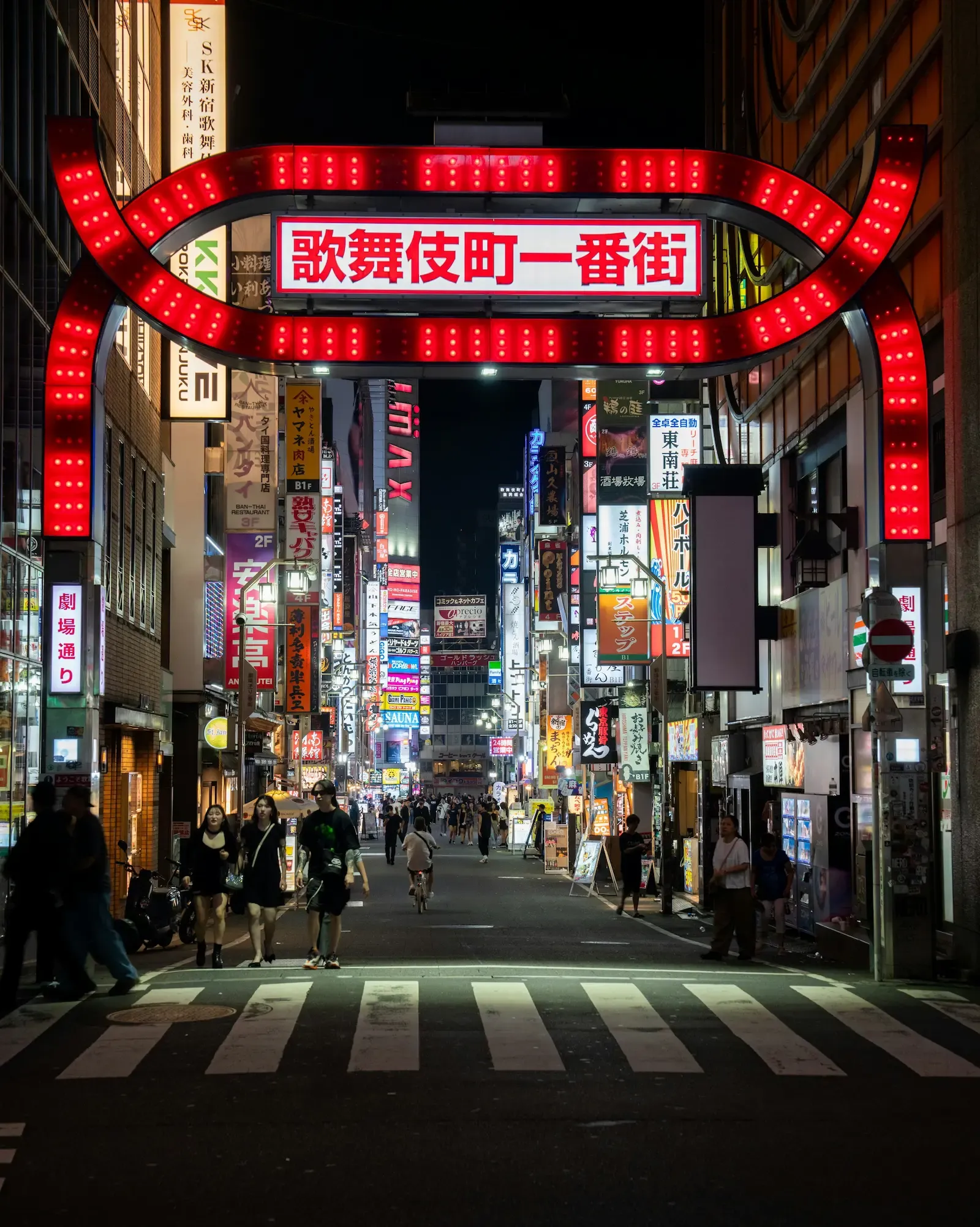 Neon-lit streets and nightlife in Shinjuku, Tokyo